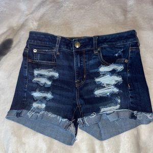 Brand~ American Eagle jean shorts, Color~ Dark Blue w/rips, Size~ US:4 & UK: 8